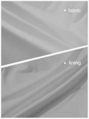 Close-up texture of glacier grey high waist built-in short a-line golf skirt with 5 pockets fabric showing weave detail.