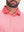 Front shot from nose to chest of model wearing brick red moisture wicking jacquard golf shirts