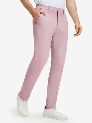 Front lower body shot of model wearing pink stretch cotton blend slim fit golf trousers 5 pockets