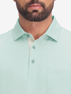  Front view from nose to chest in light green heather of performance heather contrast collar polo shirts.