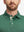 Front shot from nose to chest of model wearing green classic lightweight jacquard golf shirts