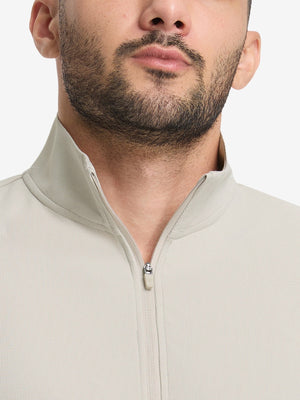 Front view from nose to chest of model wearing oyster gray waffle texture 1/4 zip pullover