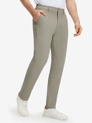 Front lower body shot of model wearing khaki grey stretch cotton blend slim fit golf trousers 5 pockets