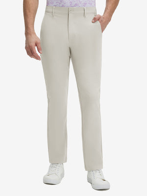 Front lower body shot of model wearing fossil straight fit lightweight dress golf pants