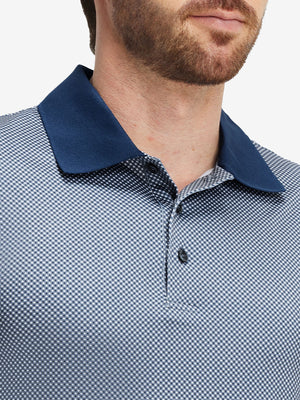 Front view from nose to chest of model wearing dark blue diamond premium ribbed collar print polo shirts