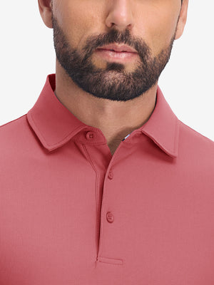 Front shot from nose to chest of model wearing brick red dry fit waffle textured collared golf shirts
