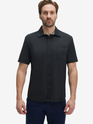 Front upper body shot of model wearing black cool print plain button up shirts