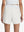 Back lower body shot of model wearing white women's gym golf shorts with liner pocket