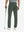 Rear lower-body: model in grey green stretch quick dry casual golf pants with 4 pockets holding golf club in right hand.
