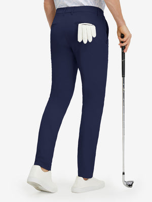 Back lower body shot of model wearing dark blue stretch cotton blend slim fit golf trousers 5 pockets