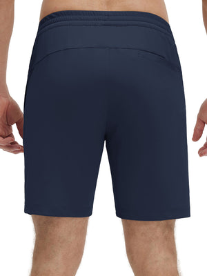 Back lower body shot of model wearing navy 4 way stretch breathable workout athletic shorts