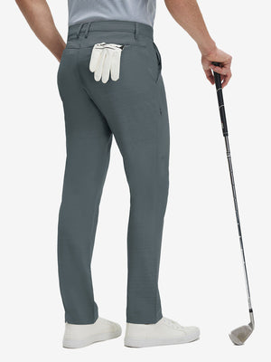 Back lower body shot of model wearing iron grey straight fit lightweight dress golf pants