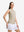 Front upper body shot of model wearing beige white women's q-zip pin striped texture golf shirts