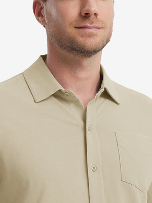 Model front view from nose to chest wearing khaki cotton blend plain shirt.