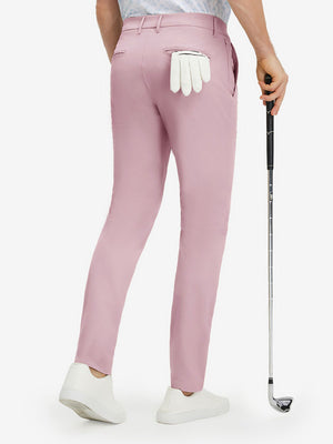 Back lower body shot of model wearing pink stretch cotton blend slim fit golf trousers 5 pockets