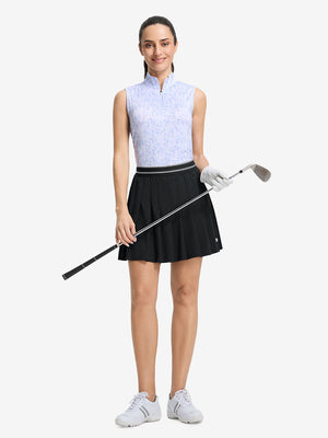 Front full body shot of model with golf gear wearing black women's moisture-wicking athletic tennis skirts