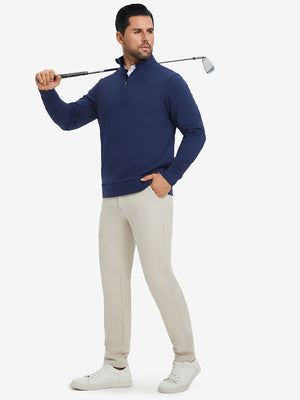 Model carrying a golf club on shoulder, wearing light khaki lightweight moisture wicking dress pants.