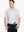 Half-body front view of model holding golf club wearing WHITE GEO Performance Quick Dry Print Golf Polo.