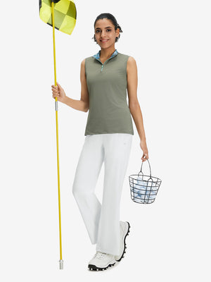 Front full body shot of model wearing white women's high waist stretch golf pants with pockets