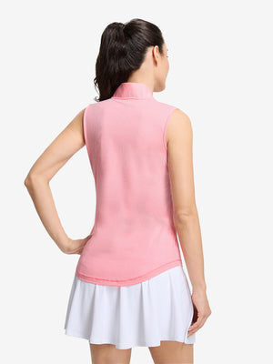 Back upper body shot of model wearing pink coral white women's q-zip pin striped texture golf shirts