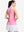 Back upper body shot of model wearing  pink white florals women's sleeveless q-zip print quick dry golf tops