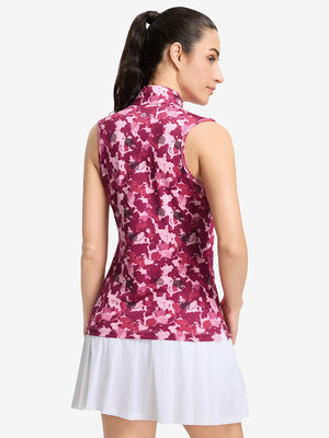 Back upper body shot of model wearing red splatter women's sleeveless q-zip print quick dry golf tops