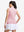 Back upper body shot of model wearing lavender women's moisture-wicking mock neck sleeveless golf tops