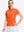 Front upper body shot of model wearing orange women's 5 buttons collared polo shirts