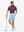 Front full body shot of model wearing light blue flat front hybrid golf shorts