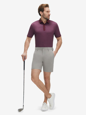 Front full body shot of model wearing light gray flat front hybrid golf shorts