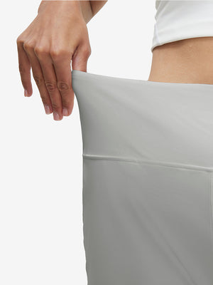Detail view of elastic waistband on glacier grey women's high waist 2 in 1 quick dry shorts with 7 pockets