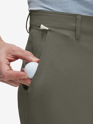 Detail view of front pocket on tea brown straight fit lightweight dress golf pants