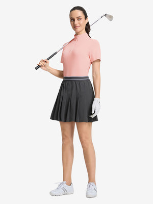 Front full body shot of model exercising in coral powder women's breathable 1/4 zip pullover golf shirts