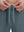 Close-up of elastic waistband on misty blue superion softness mesh joggers with zipper pockets