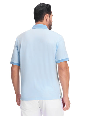 Back upper body shot of model wearing light blue moisture wicking jacquard golf shirts