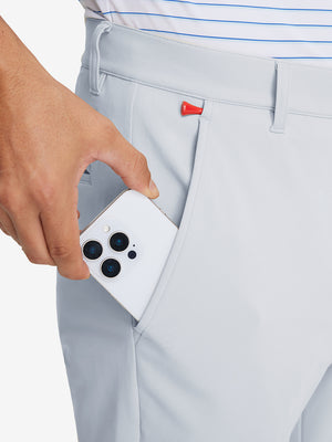 Back pocket detail ofGolf Lightweight Fleece Lined Dress Pants in misty grey