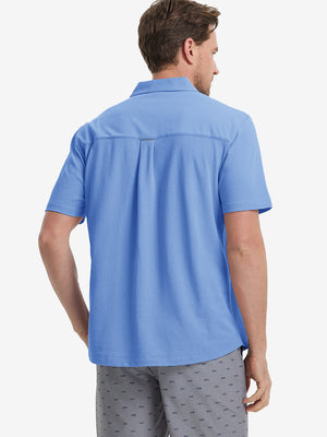 Model half-body back view wearing blue cotton blend plain shirt.