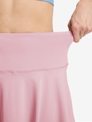 Detail view of skirt elasticity on lavender women's high waisted golf skirts with 4 inner pockets