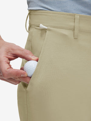 Detail view of front pocket on khaki straight fit lightweight dress golf pants