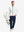 Front full body shot of model wearing white warm puffer winter golf jacket and holding a golf bag