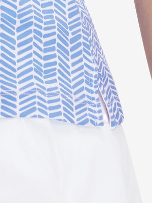 Detail view of hem on white blue stripes women's sleeveless v-neck print golf shirts