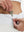 Detail view of inner pocket on white women's gym golf shorts with liner pocket