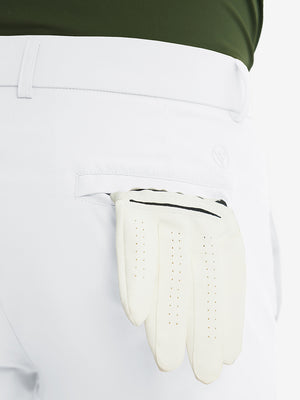 Rear view showing back pockets of white stretch quick dry casual golf pants with 4 pockets
