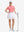 Front full body shot of model exercising in pink women's 5 buttons collared polo shirts