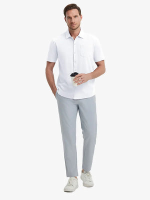 Full-body view of model holding takeaway drink cup in WHITE Cotton Blend Plain Shirt.