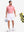 Front full body shot of model exercising in brick red moisture wicking jacquard golf shirts