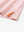 Detailed close-up of side hem slit on ORANGE SEA WAVE Performance Print Boys Golf Polo for comfort