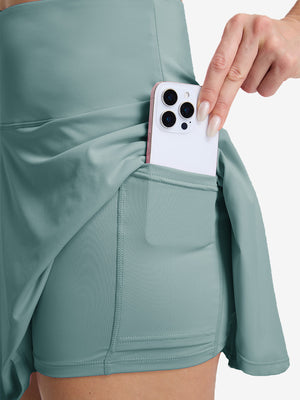 Detail view of inner pocket on dusty blue women's high waisted golf skirts with 4 inner pockets