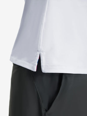 Detail view of hem on white women's athletic quarter zip tank tops