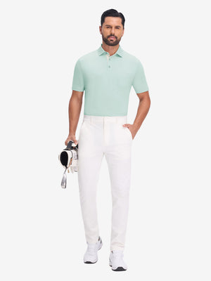 Front full body with golf bag in light green heather of performance heather contrast collar polo shirts.